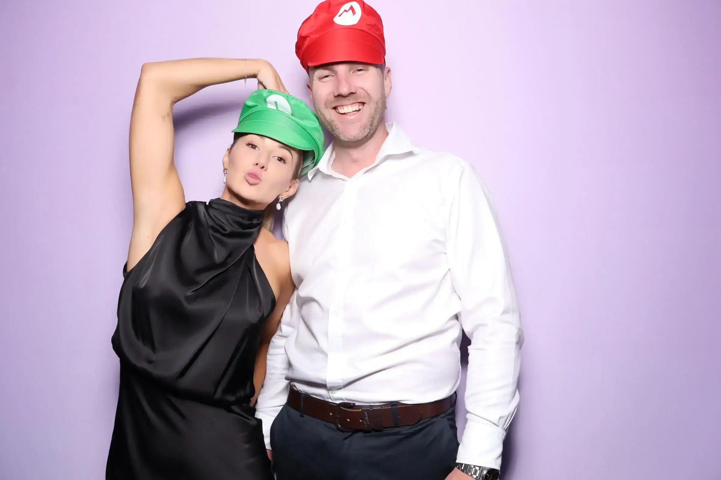 Guests using a Milas Events photo booth at a Sydney celebration