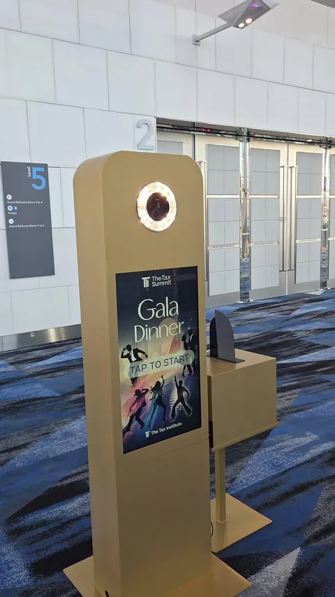 Gold Photo Booth showing its camera, screen and matching printer stand